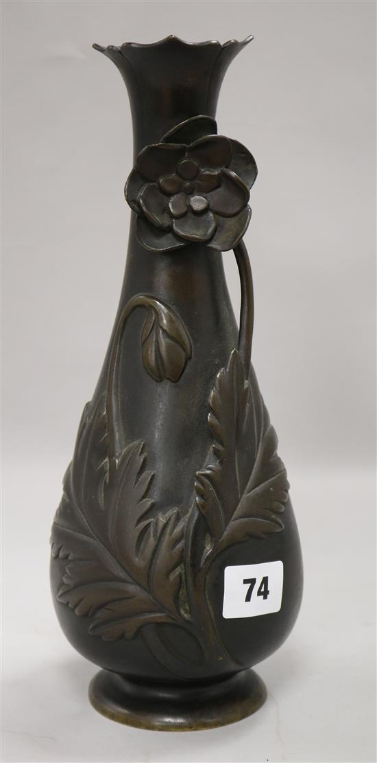 A Meiji period Japanese cast bronze baluster vase H.29cm